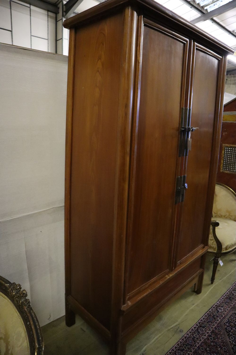 A Chinese wardrobe, width 104cm, depth 50cm, height 197cm